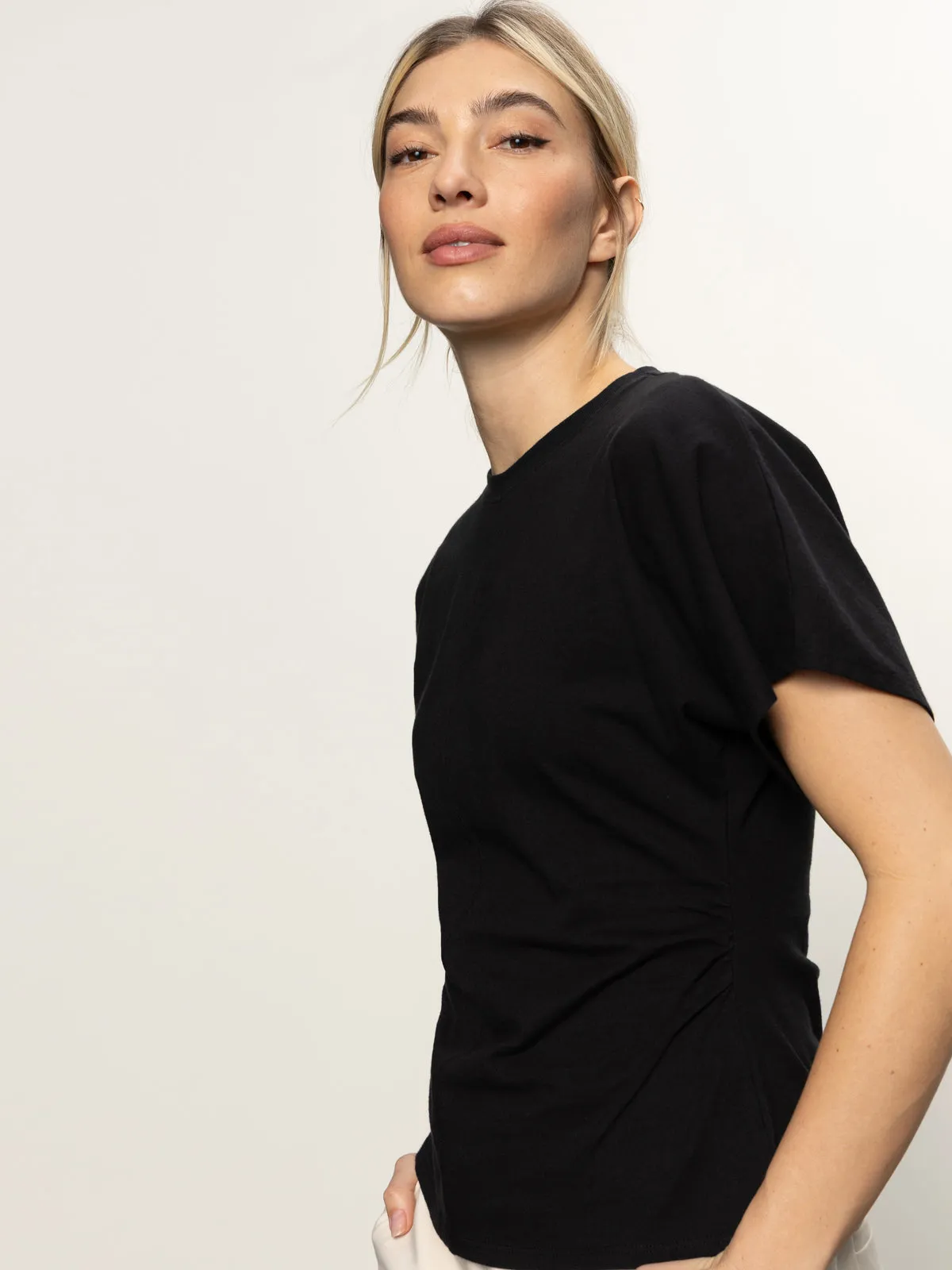 Subtle Texture Weave Shirred Waist Dolman Tee Black