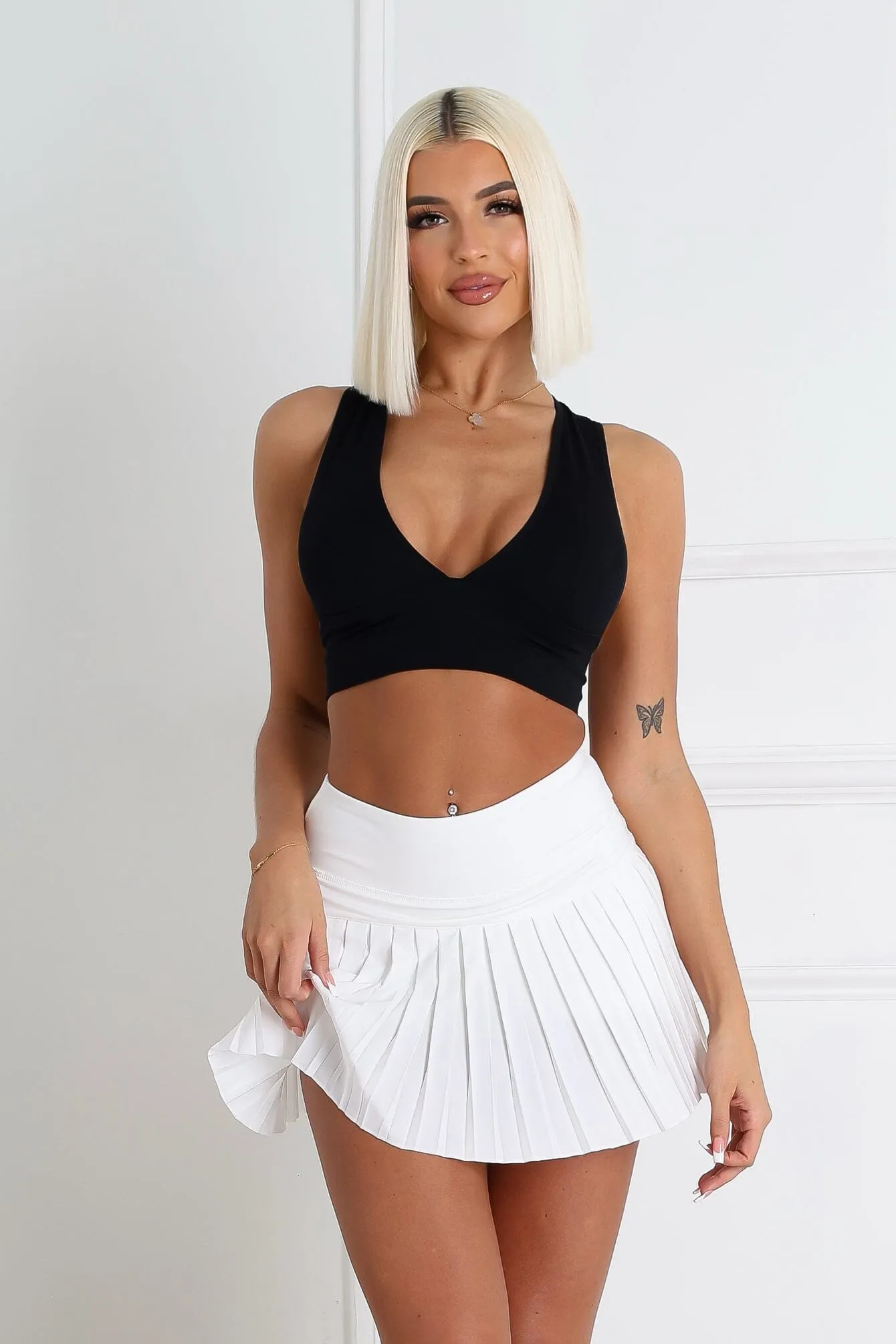 Minimalist Silhouette High Neckline Structure The Baby Ribbed Deep V-Neck Top